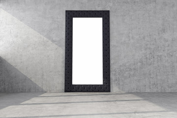 mirror in a wide black frame on a concrete wall