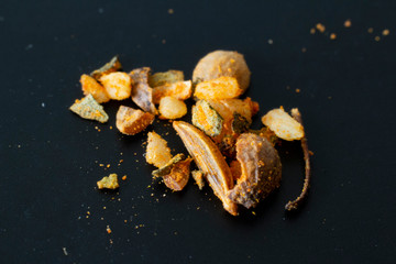  spices on black background