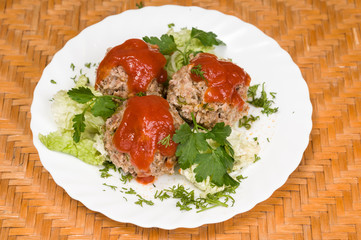 meatballs with salad and sauce