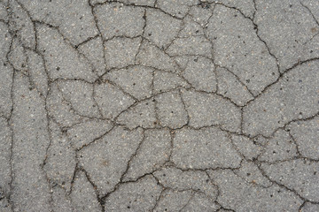 destructed tar road in a town