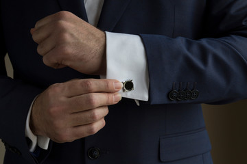 the businessman wear suit with cuff link for job concept.