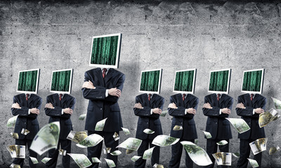 Businessmen with monitors instead of head.