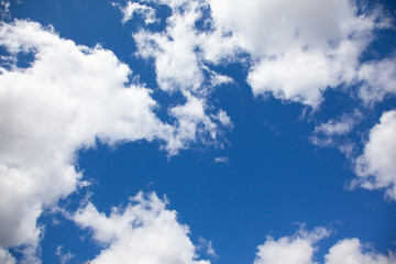 spring sky with white clouds and blue sky.