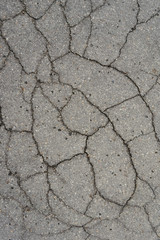 destructed tar road in a town
