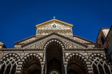 Fototapeta na wymiar Front entrance of the Amalfi cathedral dedicated to the Apostle Saint Andrew in the Piazza del Duomo in Amalfi Italy