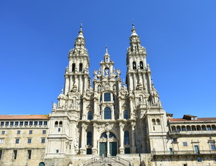 Cathedral, baroque facade with blue sky. Santiago de Compostela, Plaza del Obradoiro, Spain.
