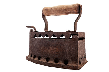 Close up of an antique and rusty iron from coal ironing with wooden handle, isolated on white...