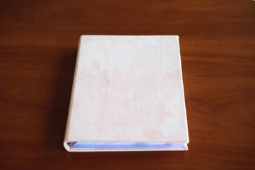 Fototapeta premium Invitations, notepad, handmade notebook on the wooden table.