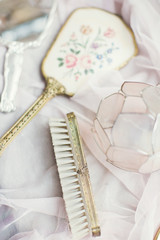 Vintage hand mirror and hairbrush