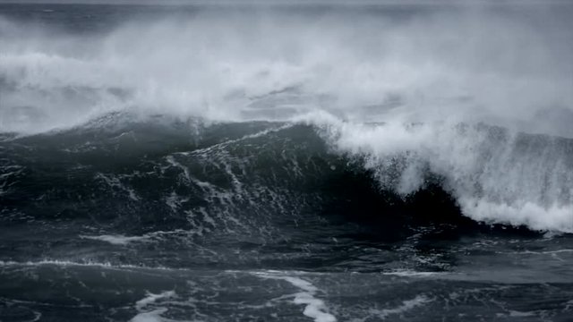 Rough ocean waves breaking in slow motion