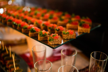 Tartlets with red caviar.