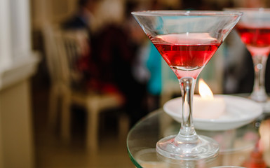 Festive banquet. .A glass of red wine