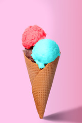 Ice cream cone with three different scoops of ice cream