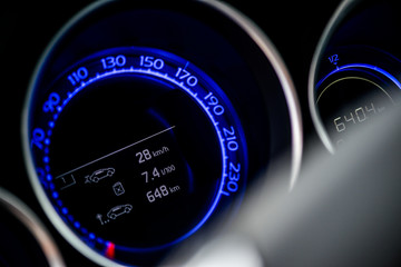 speedometer on black background