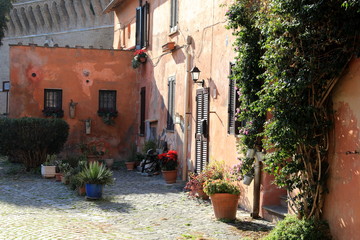Fototapeta na wymiar Classic old style of Rome backyard, Italy