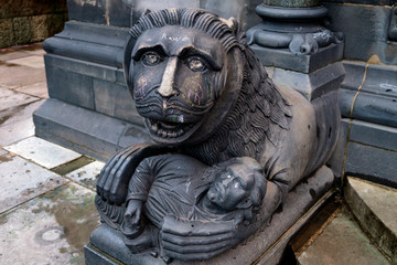 Painted with vandals Sphinx statue in front of Cathedral in Bremen, Germany. March 2019