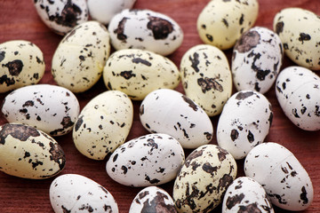 Quail eggs on the wooden table