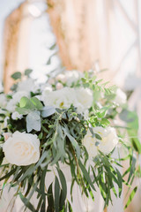  flower arrangement at a wedding ceremony
