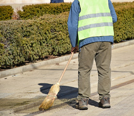 Street cleaner at work on the road