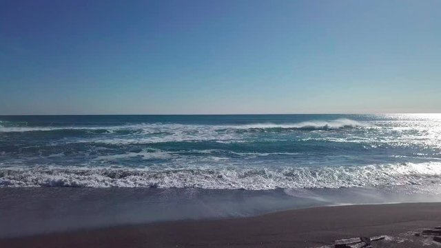 Drone footage of ocean waves near kamchatka coastline.