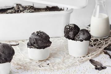 Black vanilla and sesame Ice Cream in paper cups