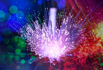 Obraz na płótnie Canvas Fiber optics network cable lights abstract background
