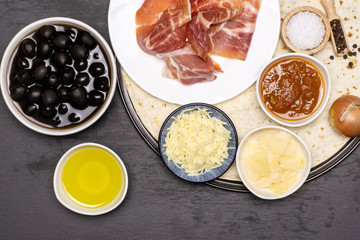 Set of ingredients. recipe step by step pizza capricciosa flatlay on grey stone