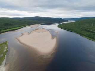Aerial view of Teno aka Tana river between Norway and Finland at summer. Teno river is well known...