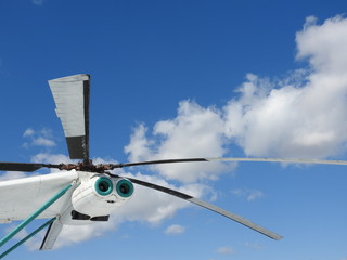 Military helicopter, propellers, installations and units for shooting, close-up.