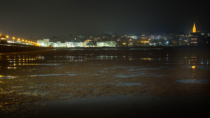 Ryde sea front: on the sands at low tide and at night