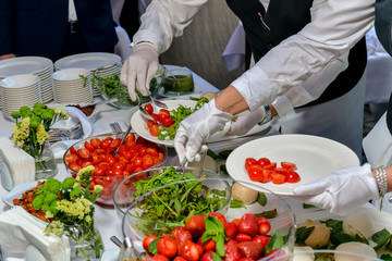 waiter holding a tray with glasses of champagne