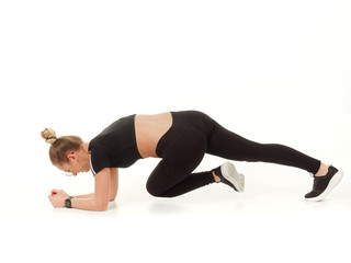 Naklejka premium girl doing fitness on a white background.