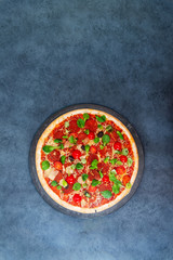 Sausage Pizza with Ham and tomatoes