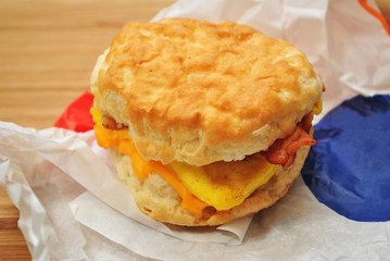 Egg & Bacon Breakfast Sandwich on a Browned Biscuit  - Powered by Adobe