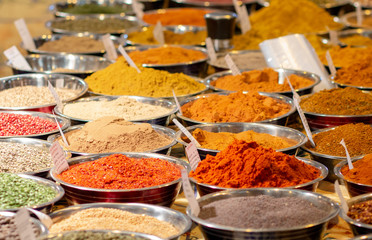 variety of oriental spices in plates for sale