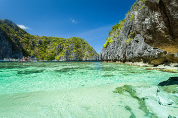 Beautiful tropical blue lagoon. Scenic landscape with sea bay and mountain islands, El Nido, Palawan, Philippines