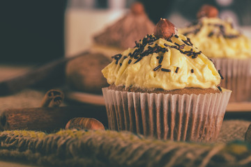 Chocolate muffin cupcake with vanilla cream