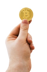 Man holding physical version of golden bitcoin on white background.