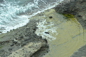 waves crashing on rocks