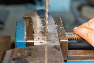 Drilling holes in a metal knife handle