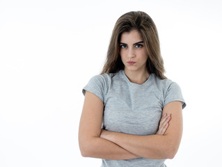 Fototapeta premium Portrait of a beautiful young woman with angry face looking furious. Human expressions and emotions