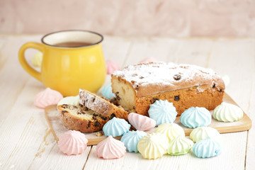 Delicious homemade cake with raisins on a light wooden background. close-up. rustic. copy space.