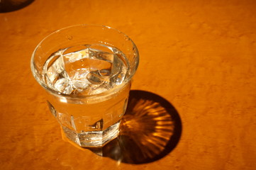 Glass and water on the table