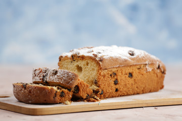 Delicious homemade cake with raisins on a light wooden background. close-up. rustic. copy space.