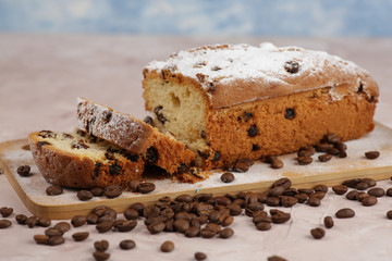 Delicious homemade cake with raisins on a light wooden background. close-up. rustic. copy space.