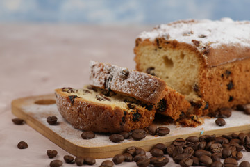 Delicious homemade cake with raisins on a light wooden background. close-up. rustic. copy space.