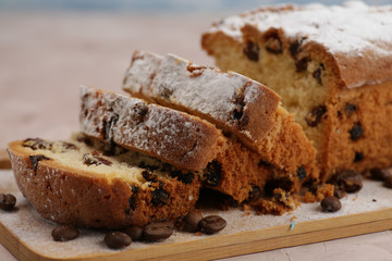 Delicious homemade cake with raisins on a light wooden background. close-up. rustic. copy space.