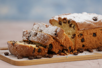 Delicious homemade cake with raisins on a light wooden background. close-up. rustic. copy space.