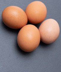  raw eggs on a natural background