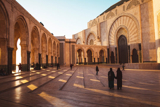 people walking in hassan ii mosquepeople walking in hassan II mosque square - Casablanca, Morocco